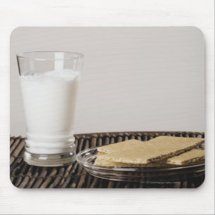 Plate of snacks with a glass of milk mouse pad