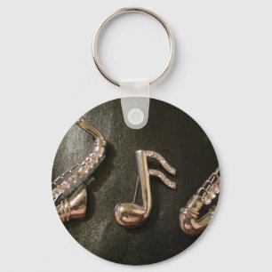 Play a musical note on that Saxaphone Key Ring