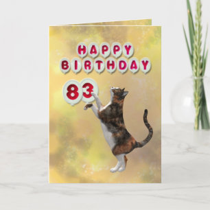 Playful cat and 83rd Happy Birthday balloons Card