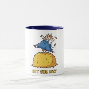 Playful Cow Jumping on Hay Mug
