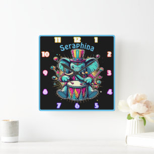 Playful elephant drummer under bright lights square wall clock
