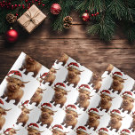 Playful Highland Cow Wrapping Paper<br><div class="desc">Your friends and family with be “aMOOsed” by our Playful Highland Cow holiday wrapping paper! This mischievous little bovine,  bedecked with an adorable plaid “Santa” hat,  will be sure to bring a smile to your “herd.” Watch for more to come in our Highland Cow Collections!</div>