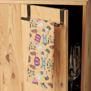 Playful kitchen-themed pattern featuring aprons tea towel