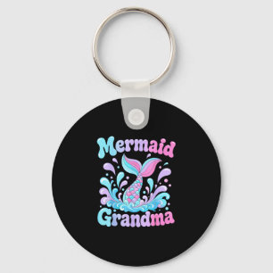Playful mermaid tail with water splashes design  key ring