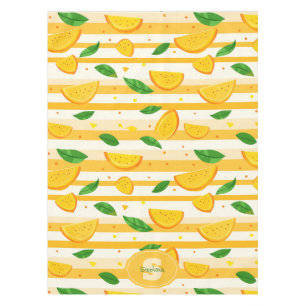Playful Orange Slice Pattern with Green Leaves Tablecloth