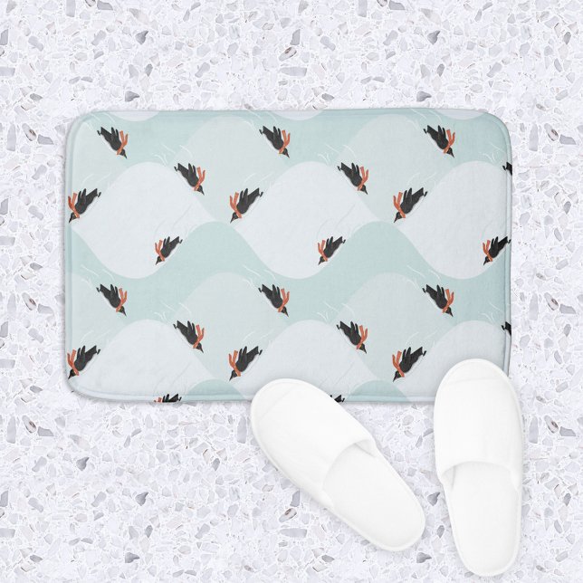 Playful Penguins Sliding on Snow Pattern Bath Mat (Penguins sledding in the snow pattern bath mat)