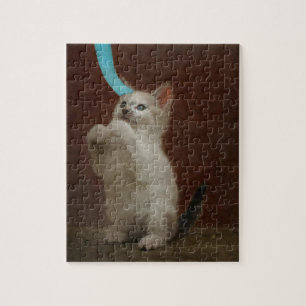 Playing Kittie Jigsaw Puzzle