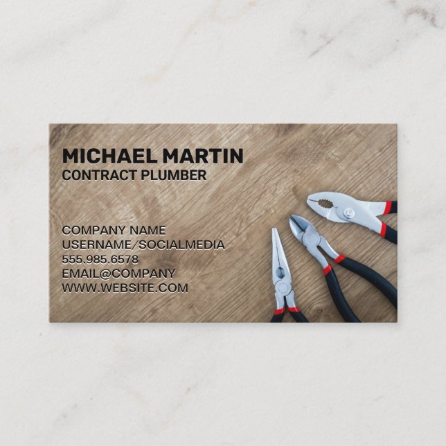 Pliers on Wood Table Business Card (Front)