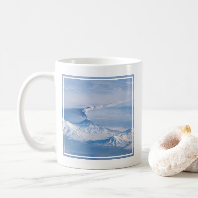 Plume Emanating From Kliuchevskoi Volcano. Coffee Mug (With Donut)