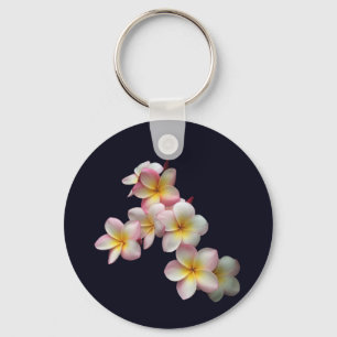 Plumeria blossoms on dark blue key ring