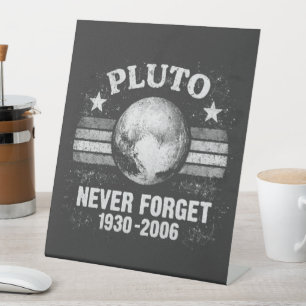 Pluto Never Forget Pedestal Sign