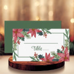 Poinsettia Winter Floral Wedding Red Christmas Place Card<br><div class="desc">Looking to add some cosy charm to your winter wedding or Christmas party? Look no further than these adorable red Christmas floral escort place cards! These cards boast beautiful watercolor yellow flowers nestled in lush greenery, making them the perfect addition to any winter event - from a bridal shower to...</div>