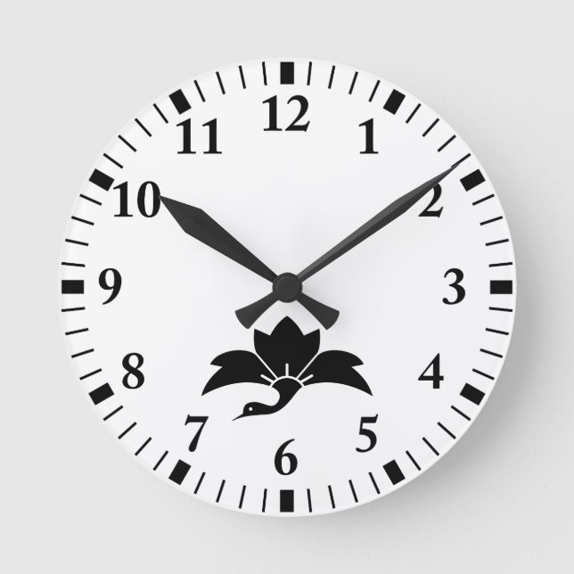 Pointed-leaf crane-shaped rhombic flower round clock (Front)