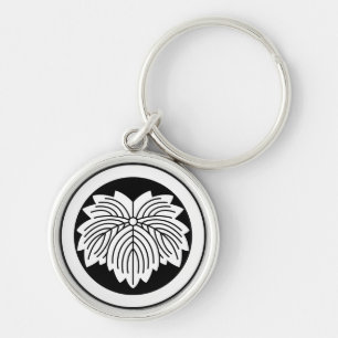 Pointed-leaf ivy in circle key ring