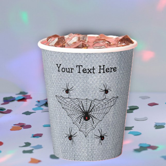 Poisonous Black Widow Spiders in Web on White Paper Cups (Poisonous black widow spider hourglass marks in triangle shaped black web on rustic white paper cup.)