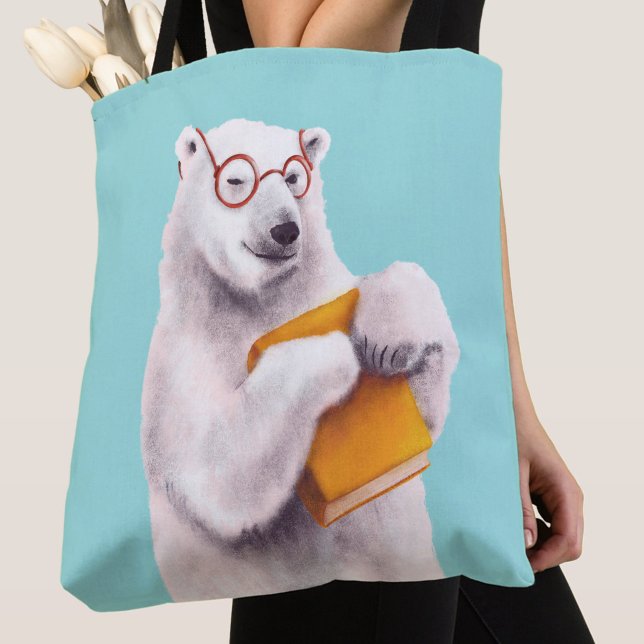 Polar Bear Book Lover Nerdy Tote Bag (close up of a blue tote bag with polar bear book lover with eyeglasses and yellow book)
