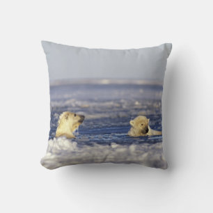 Polar bear cubs playing cushion