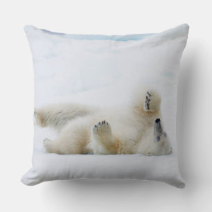 Polar bear rolling in snow, Norway Cushion