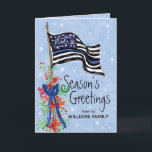 Police Thin Blue Line Flag Seasons Greetings Holiday Card<br><div class="desc">This holiday card for police and law enforcement features an artistically painted thin blue line American flag decorated with red berries and sprigs of pine.. The front of the card reads "Season's Greetings" with your name to personalise. Inside of the card has a custom message with your signature. Designed by...</div>