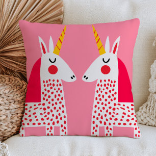 Polka Dotted White Unicorns on Pastel Pink Cushion