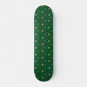 Polka hearts on forest green skateboard