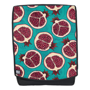 Pomegranate slices on turquoise backpack