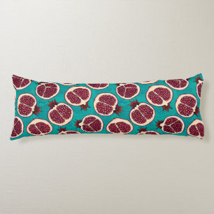 Pomegranate slices on turquoise body cushion