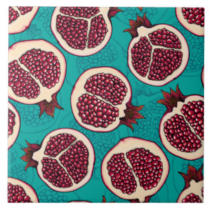 Pomegranate slices on turquoise ceramic tile