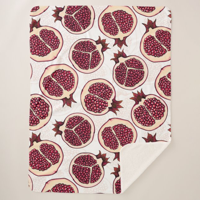 Pomegranate slices on white sherpa blanket (Front)