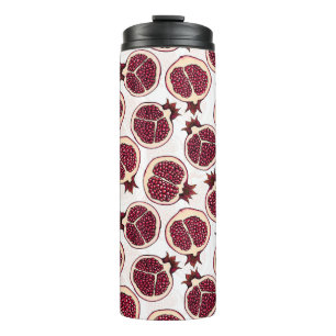Pomegranate slices on white thermal tumbler