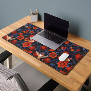 Pomegranates and hummingbirds/blue leaves on black desk mat