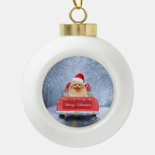 Pomeranian Dog in Snow sitting in Christmas Truck Ceramic Ball Christmas Ornament