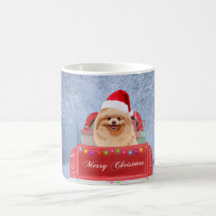 Pomeranian Dog in Snow sitting in Christmas Truck  Coffee Mug