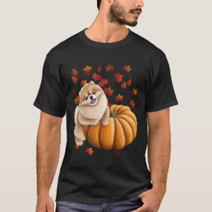 Pomeranian Puppy Leaning On A Pumpkin With Falling T-Shirt