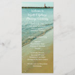 Ponce Inlet Tall Wedding Program Template<br><div class="desc">Tall, double-sided marriage ceremony program with beach and water background. The Ponce Inlet lighthouse is visible at the top of the image. On the front the text is white, and black on the back. Meant for a casual seaside wedding celebration, the text is easy to change and use spaces where...</div>