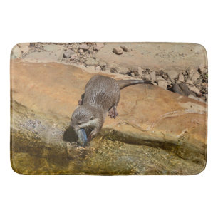 **"Pondside Feast: An Otter and His Catch"** Bath Mat