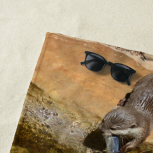 **"Pondside Feast: An Otter and His Catch"** Beach Towel