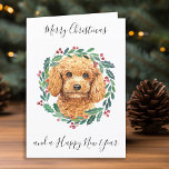 Poodle Merry Christmas Trendy Dog  Holiday Card<br><div class="desc">Send christmas greetings this holiday season with this elegant Merry Christmas poodle in a wreath design card, and matching decor. This apricot poodle holiday card features a watercolor dog in a green and red wreath with holly and berries. Personalise with family name . This poodle christmas card will be a...</div>