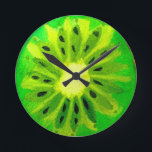 Pop art bright kiwi fruit original watercolour round clock<br><div class="desc">A cute and colourful vibrant kiwi fruit slice from an original painting by artist Sacha Grossel. This large pop art style fruit is green and very bright and colourful against a customisable yellow coloured background. Quirky and original.</div>