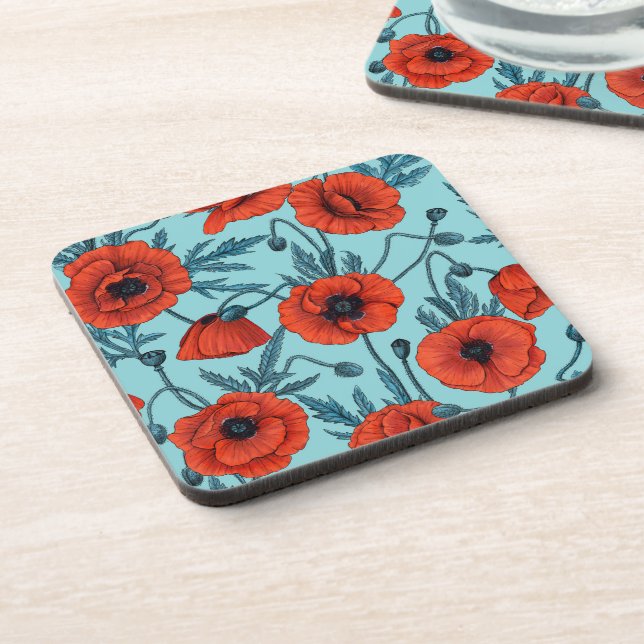 Poppies, red and blue on pool blue coaster (Left Side)