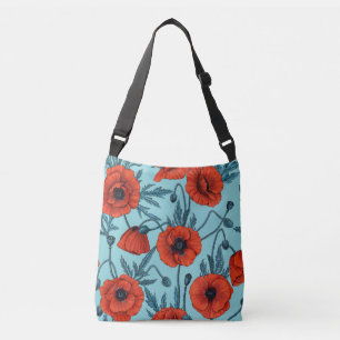 Poppies, red and blue on pool blue crossbody bag