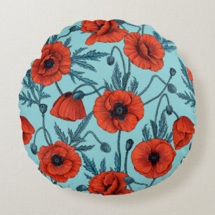 Poppies, red and blue on pool blue round cushion