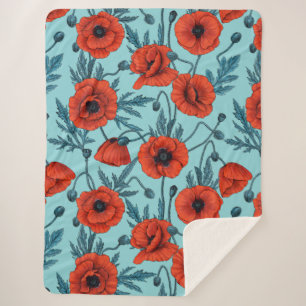 Poppies, red and blue on pool blue sherpa blanket
