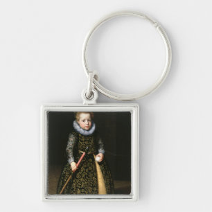 Portrait of a four-year old boy with club and key ring
