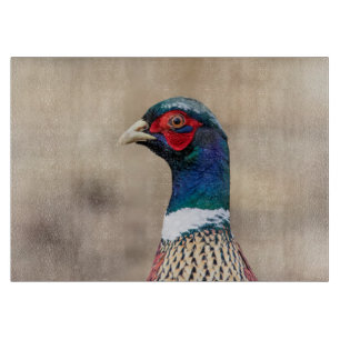 Portrait of a pheasant cutting board