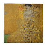 Portrait of Adele Bloch-Bauer I by Gustav Klimt Ceramic Tile<br><div class="desc">Portrait of Adele Bloch-Bauer I (1903-1907) by Gustav Klimt is a vintage Victorian Era Symbolism fine art portrait painting. Portrait of Adele Bloch-Bauer I is also known as The Lady in Gold or the Woman in Gold. The portrait shows Adele Bloch-Bauer sitting on a golden chair in front of a...</div>
