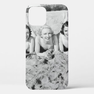 Portrait of five young women lying on the beach an iPhone 12 case