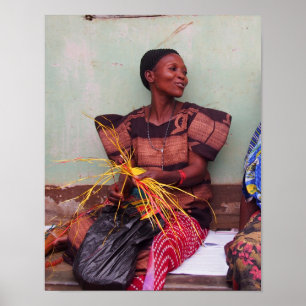 Portrait of pretty Ugandan woman weaving mat Poster