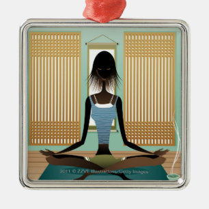 Portrait of young woman doing yoga metal tree decoration