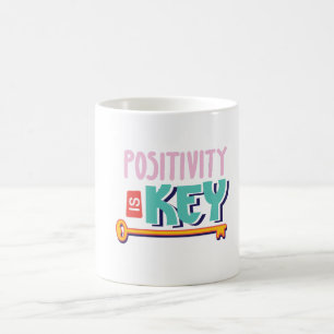 positivity is the key design  coffee mug